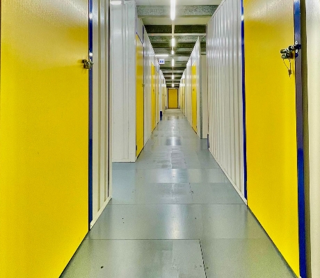 Yellow door self storage corridor